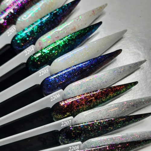 Preview: Aurora Gliltter Flocken in einem UV Gel